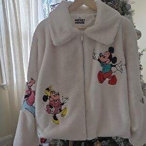 Women's White Fleece Disney Jacket with all the classic characters on it.